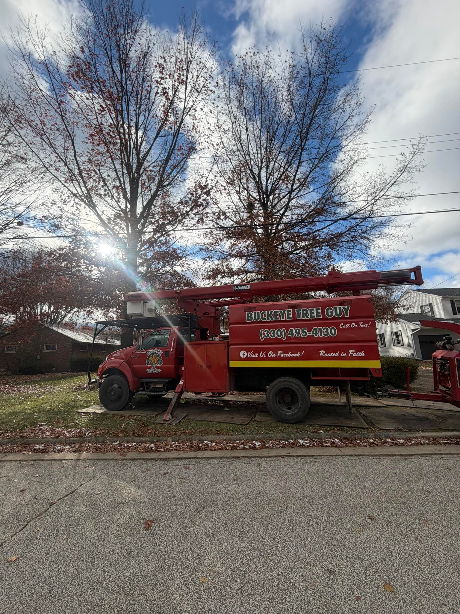 Buckeye Tree Guy truck on a job site